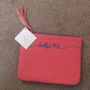 Pink Selfie kit clutch with tassel zip & keychain